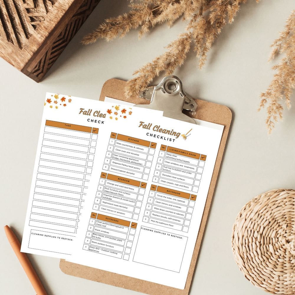 an image of a clipboard with a fall cleaning list clipped on it, a pencil and baskets on the side.